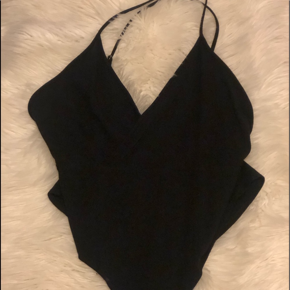 V-neck body suit.